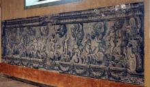 Painel em azulejo, situado no coro alto da Igreja do Colégio, Funchal, que tem emolduramento em madeira no qual também estão representados vários instrumentos musicais. 